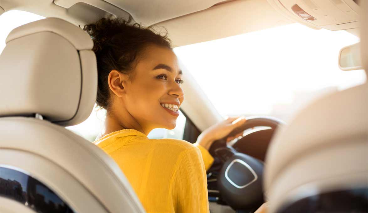 Woman driving a car.